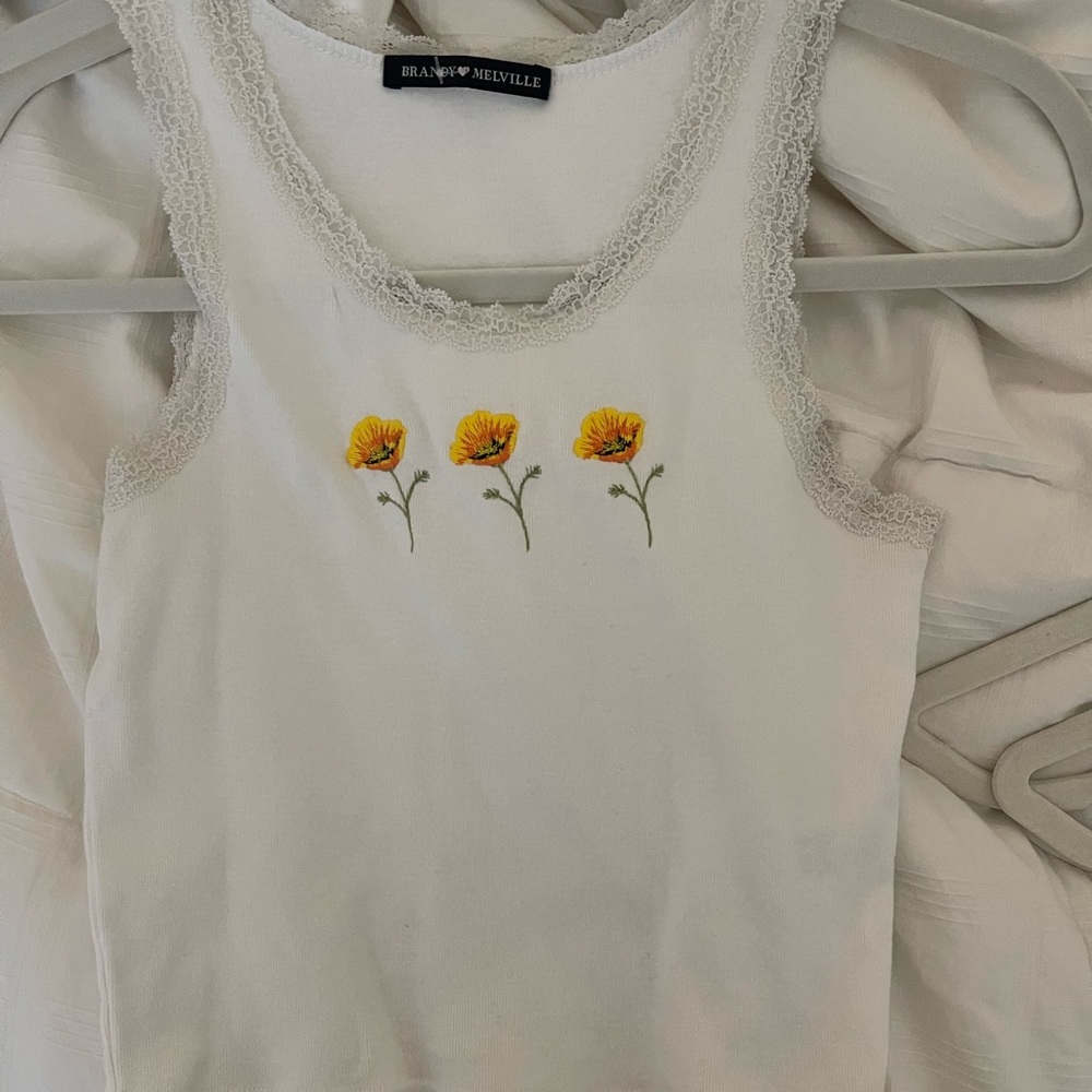 Brandy Melville yellow/white laced shirt, one size fits all, barely been worn.